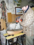 Stephen begins drilling out the hull. Photograph: Marianne Green